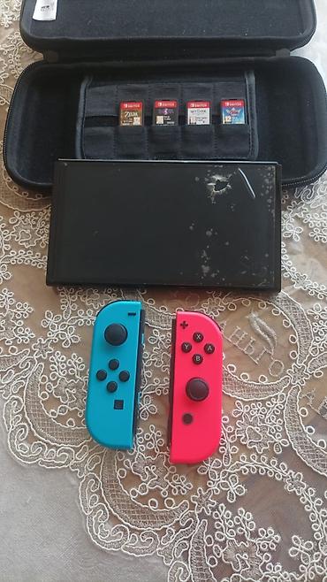 nintendo switch az: Satılır Nintendo Switch konsol set: Nintendo Switch Konsol + 4 Oyun + — 2