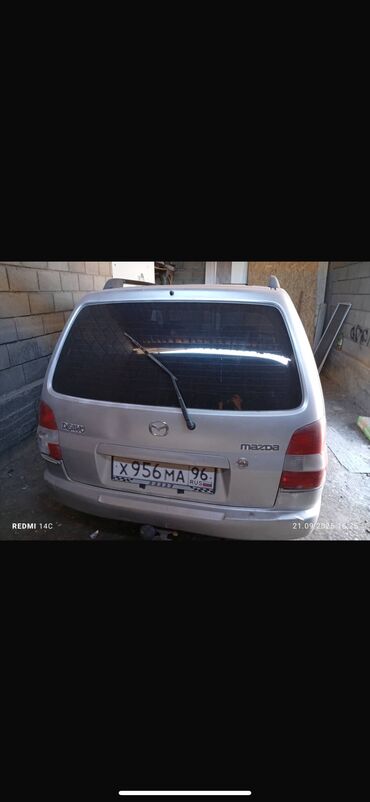 экономичные машины: Mazda Demio: 1999 г., 1.3 л, Автомат, Бензин, Хетчбек