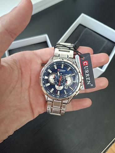Curren original qol saatı.Yeni salafanlari soyulmayib.80 manata