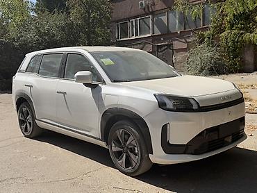 споилер: AION V — электрический кроссовер (белый цвет кузова). Кузов и — 2
