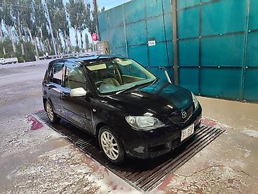 эшке: Mazda Demio: 2004 г., 1.3 л, Автомат, Бензин, Хетчбек — 5
