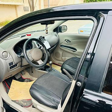 2012 07: Nissan Sunny: 1.5 l | 2012 il Sedan — 10