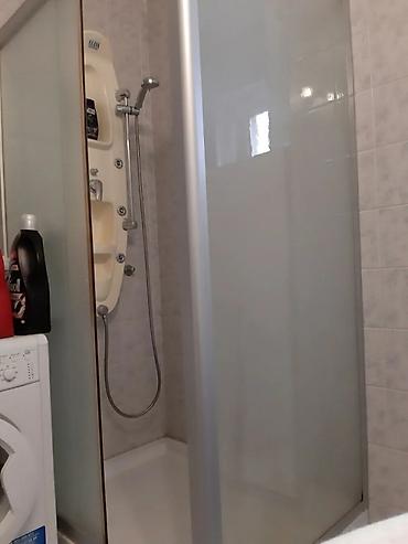 vrste satova: Tuš kabina 110x80cm, staklena, klizni deo na levo. Nema 1 staklo ( — 6
