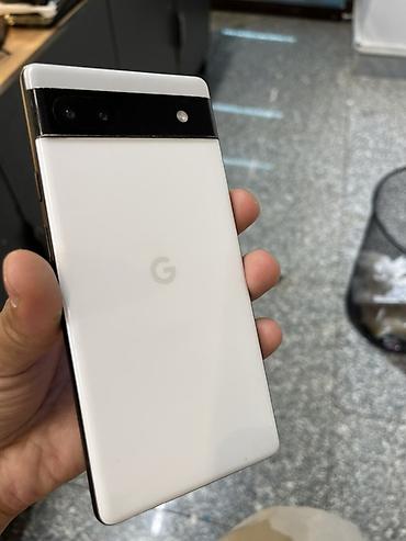 apple studio: Смартфон Google Pixel в белом цвете. Лаконичный фирменный дизайн с — 2