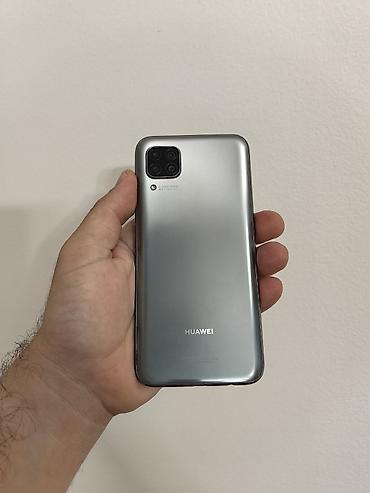 icloud cena: Huawei P40 lite sivi dual sim free, sa 6/128 gb memorije. Dobro očuvan — 5