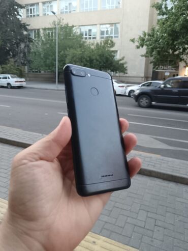 Xiaomi: Xiaomi Redmi 6, 32 GB, rəng - Qara, 
 Zəmanət, Barmaq izi, İki sim kartlı