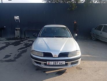 Mitsubishi Carisma: 2001 г., 0.6 л, Механика, Газ, Седан