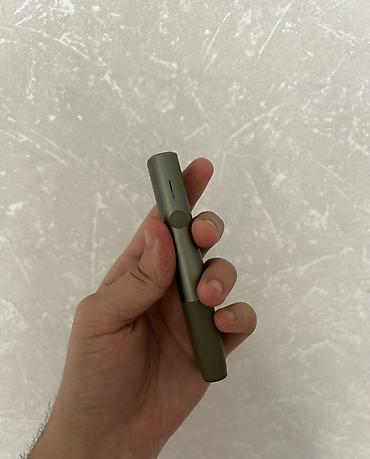 iqos stick: Məhsul: IQOS Iluma One (yaşıl rəng) Xüsusiyyətlər: - Tütün çubuqları — 3