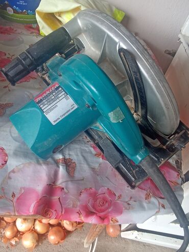 Digər mişarlar: Makita N5900B diskli dairəvi mişar - Güc: 2000 W - Gərginlik: 220–230 — 7