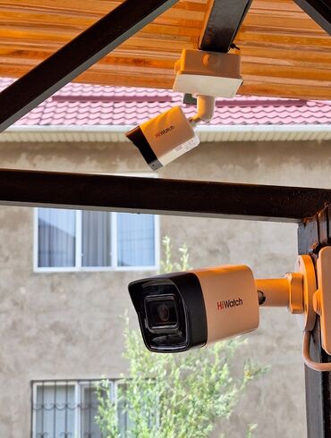 Видеонаблюдение: Белая цилиндрическая IP-камера Hikvision с кронштейном — 20