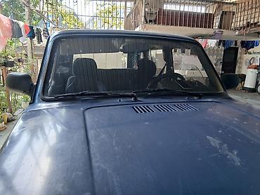 lada diskləri: LADA Niva 4x4, mavi rəng, 5 qapılı universal kuzov. Xüsusiyyətlər: - — 7