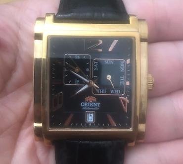 orient saat: Orient Automatic kişi saatı - Mexanizm: avtomatik (öz-özünə qurulan) — 1