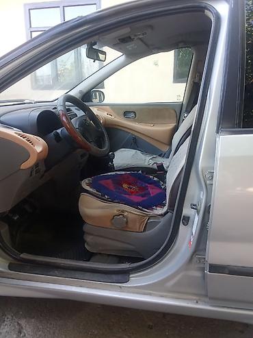 тонировка стекл: Nissan Almera Tino: 2000 г., Механика, Минивэн — 6