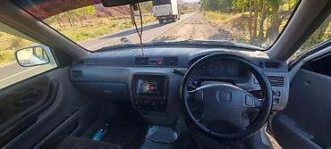 разбитые авто: Honda CR-V: 1999 г., 2 л, Автомат, Бензин, Кроссовер — 10