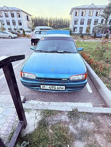 Mazda 323: 1991 г., 1.6 л, Механика, Бензин, Седан