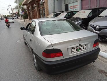 Toyota Avensis: 1.6 l | 1999 year Limousine