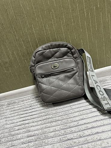 лакосте барсетки: Сумка через плечо Lacoste, компактный городской формат. Основные — 2