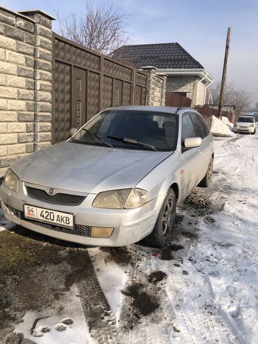 тормозные диски 211: Mazda 323: 1999 г., 1.6 л, Механика, Бензин, Хэтчбэк