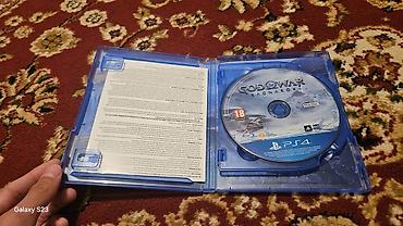 диск игр: God of War Ragnarök — диск для PS4 (официальное издание на Blu‑ray) — 2
