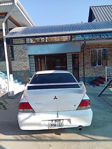 Mitsubishi Lancer: 2002 г., 1.5 л, Автомат, Бензин, Седан — 6