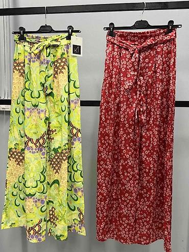 lujo torbice: Ženske široke pantalone sa printom i pojasom
1450 din
S M L — 3