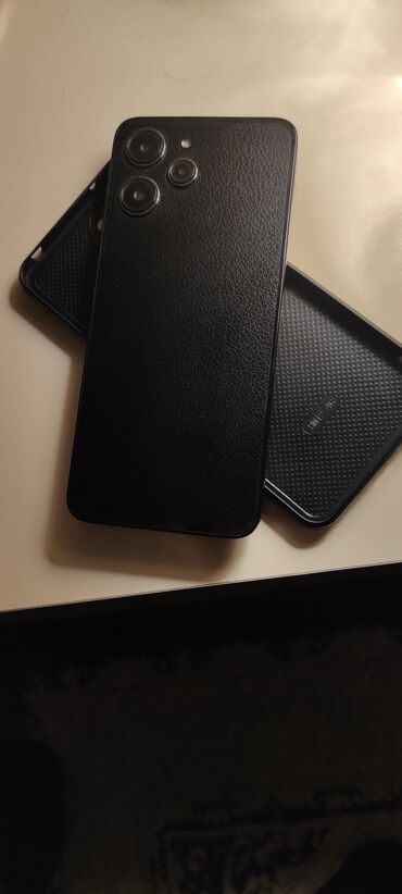 telefon krediti: Xiaomi Redmi 12, 128 ГБ, цвет - Черный, 
 Сенсорный, Отпечаток пальца, Две SIM карты
