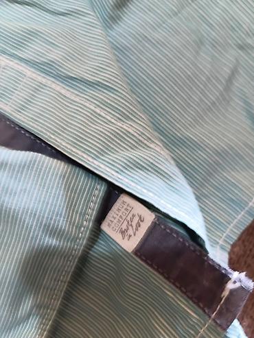 Ostala muška odeća: Muški lot garderobe koji se sastoji od tri komada: - **C&A — 12