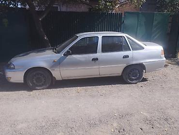 маши: Daewoo Nexia: 2012 г., Седан — 2