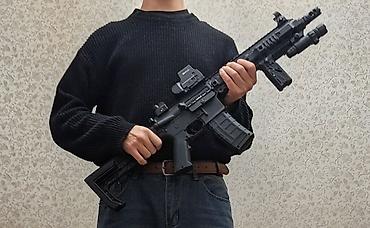 Игрушки: Продам орбизный автомат AR-15 с цевьем SLR. Есть два магазина, два — 2