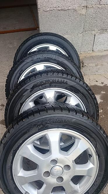 резина 18514: Комплект из 4 колес в сборе: литые диски Toyota + зимние шины Yokohama — 1