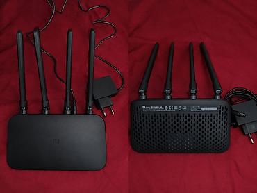 tilgin modem: Xiaomi Mi Router 4A - Model: Mi Router 4A (arxa paneldə model etiketi — 1