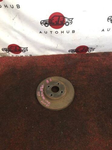 тармозной диск: Тормозной диск Mazda Demio DW3W 1.3 перед. лев. (б/у)