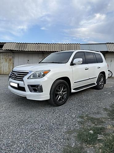 вмятина: Lexus LX: 2012 г., 5.7 л, Автомат, Газ, Внедорожник — 2
