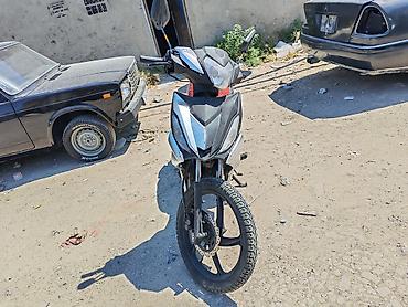 Skuter tipli motosiklet – şəhər içi komfortlu və qənaətcil sürüş üçün
