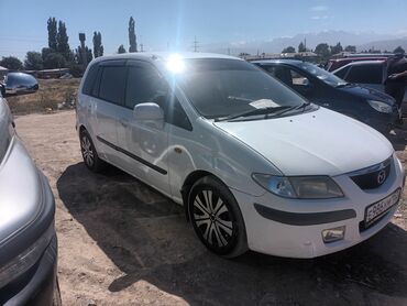 мазда фамил: Белый минивэн Mazda Premacy, идеальный для семейных поездок и