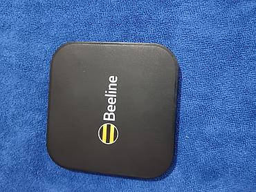 ipod 4: Беспроводное зарядное устройство Beeline с дополнительными USB-портами — 1