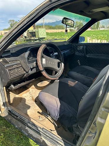 рул: Audi 100: 1984 г., 2 л, Кол менен иштөөчү, Лифтбек — 4
