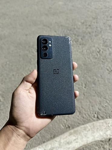 pro m1: OnePlus 9RT, Б/у, 256 ГБ, цвет - Черный, 1 SIM, 2 SIM, eSIM — 1