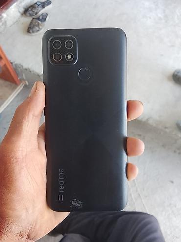 топчан фото: Смартфон realme (черный) - Корпус: матовый пластиковый, цвет — — 1