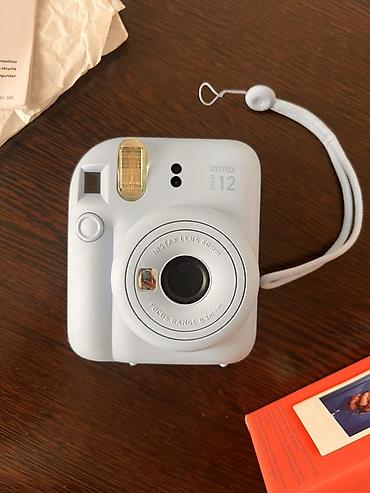 мереке видео: Fujifilm Instax mini 12 — мгновенная камера в цвете Pastel Blue — 5