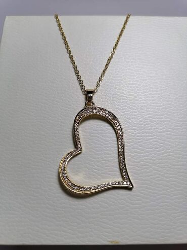 Ogrlice: Nakit, hiruški čelik
Cena 1100din — 8