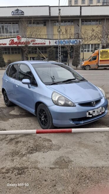 рулевой рейка хонда жазз: Хэтчбек Honda Jazz в голубом цвете, оснащенный черными литыми дисками