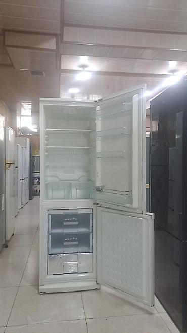 ev telefonu borcu: Arçelik soyuducu təqdim olunur. Ağ rəngli, aşağı hissədə dondurucu — 1