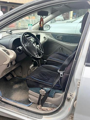venucia d60: Nissan Almera Tino: 2001 г., 2 л, Автомат, Бензин, Минивэн — 6