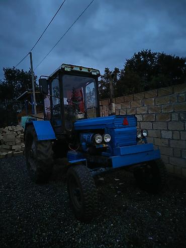 tap.az avtomobiller: Mavi rəngli kabinalı təkərli traktor - Ön kranklı, ikili dəyirmi — 4