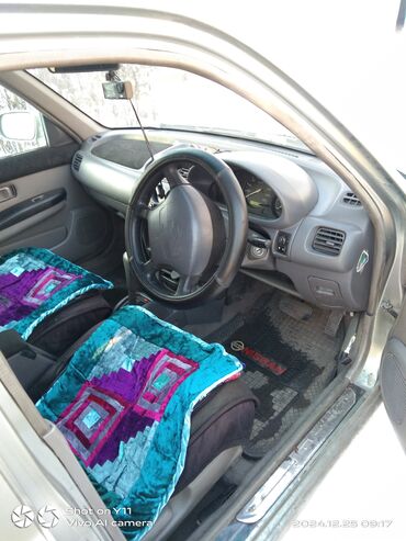 жак бу: Nissan Март: 2000 г., 1 л, Автомат, Бензин, Хетчбек