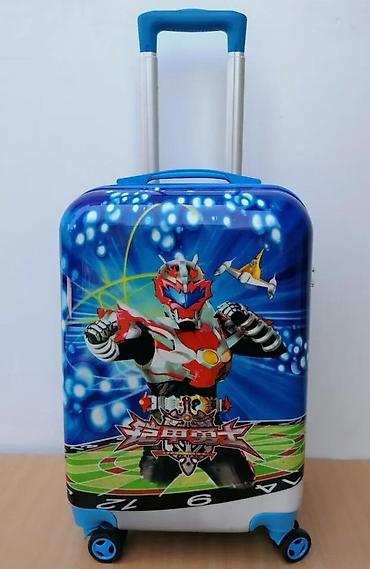 Rančevi, torbe i koferi: Dečiji putni kofer sa upečatljivim dizajnom crtanog junaka. Kofer je — 2