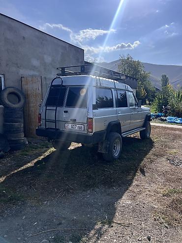 белорус 82 1: Nissan Patrol: 1983 г., 2.8 л, Кол менен иштөөчү, Бензин, Жол тандабас — 1