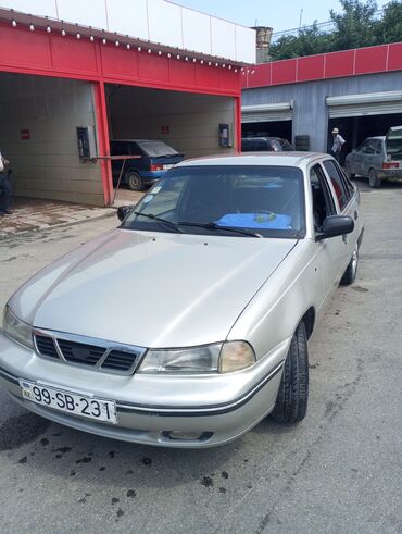 Daewoo: Model: Daewoo Nexia sedan Kuzov: 4 qapılı, gümüşü rəng — 8