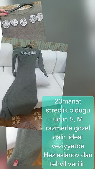 Женская одежда: Trikotaj uzun don – boz rəngdə, uzunqol, yuvarlaq yaxalı. Sinə — 1